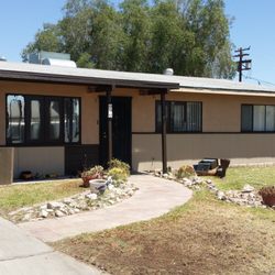 Father and Son Services - Painting a house and adding new siding