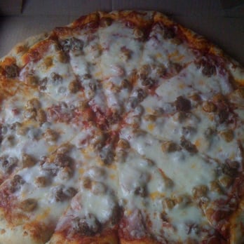 Elf's Den Restaurant & Lounge - a pizza in a box - American Near Me - North Pole, Alaska