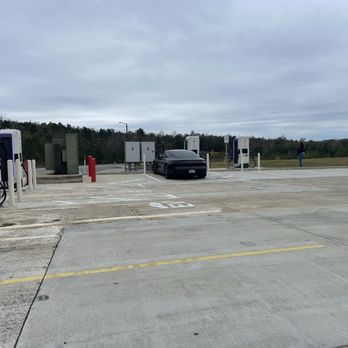 Tesla Supercharger - Look at that electric Porsche at the bobo chargers! - EV Charging Stations Near Me - Guin, Alabama Tesla Supercharger - Look at that electric Porsche at the bobo chargers! - EV Charging Stations Near Me - Guin, Alabama