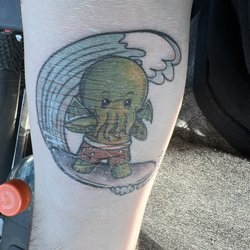 Area 51 Tattoo - Fresh tattoo with bandage on
