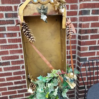 Malena's Taco Shop - A phone booth turned altar outside of Malena's Taco Shop. - Tacos Near Me - Seattle, Washington