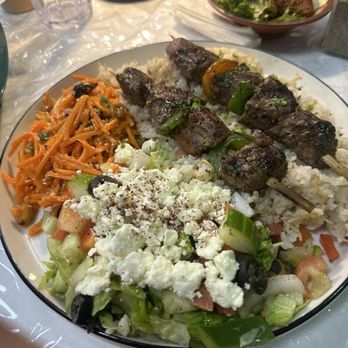 Zaytona Grill - Greek salad, carrots salad, steak skewers on rice - Mediterranean Near Me - Miami, Florida Zaytona Grill - Greek salad, carrots salad, steak skewers on rice - Mediterranean Near Me - Miami, Florida