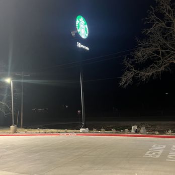 Starbucks - a starbucks sign lit up at night - Coffee & Tea Near Me - Springtown, Texas