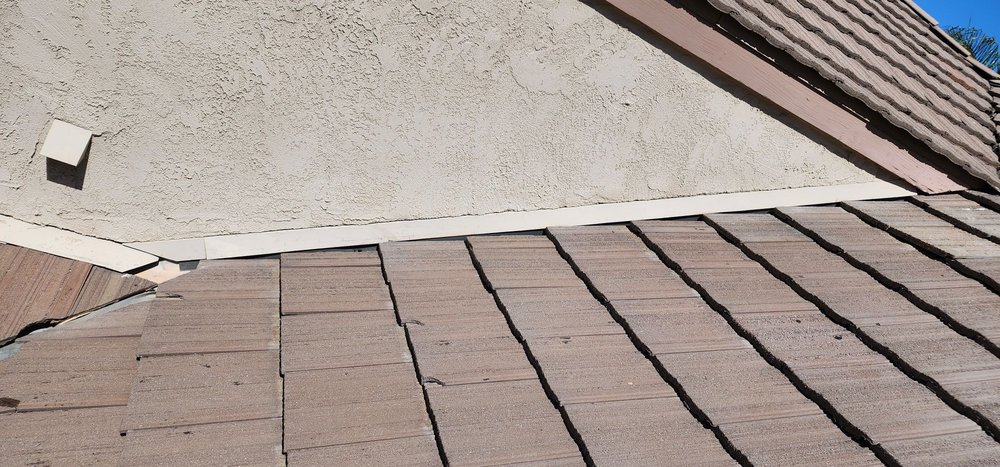 Slide of Bigfoot Roofing