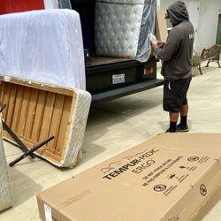Our old mattress loaded up & taken away, free of charge. Goodbye to a tired King Size bed. It's about time