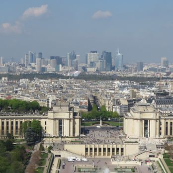 La Tour Eiffel - The Défense area of the new office and residential section of Paris in the distance. - Landmarks & Historical Buildings Near Me - Paris, 75