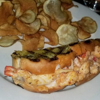 Off The Hook Raw Bar & Grill - Maine lobster roll with chips - Seafood Near Me - Astoria, New York Off The Hook Raw Bar & Grill - Maine lobster roll with chips - Seafood Near Me - Astoria, New York