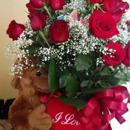 A picture of half of the flowers delivered. This one had the bear. A picture of half of the flowers delivered. This one had the bear.