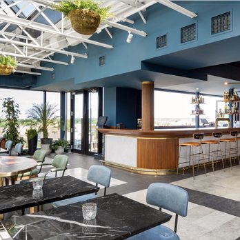 The Rooftop - a view of the bar and dining area - Cocktail Bars Near Me - Toronto, Ontario