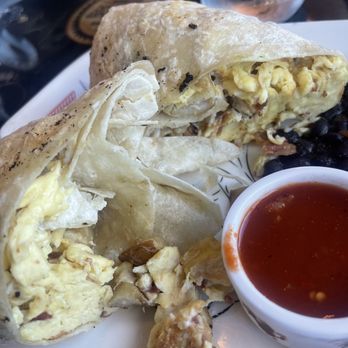 Breakfast Republic - This was the breakfast burrito but it was missing the guacamole, pico de gallo, steak and it had raw bacon. - Breakfast & Brunch Near Me - Palm Desert, California Breakfast Republic - This was the breakfast burrito but it was missing the guacamole, pico de gallo, steak and it had raw bacon. - Breakfast & Brunch Near Me - Palm Desert, California