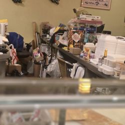 Yamatani Japanese Restaurant - Hoarders store their junk at sushi bar counter tops
