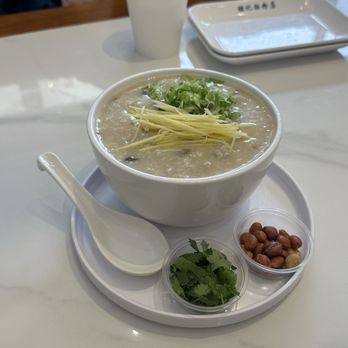 Yin Ji Rice Roll - Pork and C09. Preserved Egg and Pork Congee with added cilantro and peanuts - Cantonese Near Me - Philadelphia, Pennsylvania Yin Ji Rice Roll - Pork and C09. Preserved Egg and Pork Congee with added cilantro and peanuts - Cantonese Near Me - Philadelphia, Pennsylvania