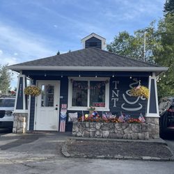 T N T Espresso - Out front (waiting in the line). They are drive thru only