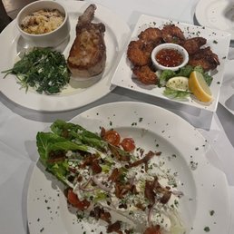 Wedge salad, coconut shrimp, pork chop Wedge salad, coconut shrimp, pork chop