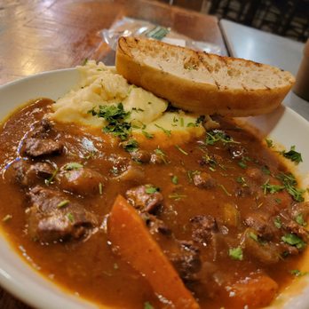 Urban Plates - Braised beef on Mashed potatoes. - New American Near Me - Brea, California Urban Plates - Braised beef on Mashed potatoes. - New American Near Me - Brea, California