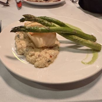 Baker Street Steakhouse - Sea bass over risotto - Steakhouses Near Me - Fort Wayne, Indiana Baker Street Steakhouse - Sea bass over risotto - Steakhouses Near Me - Fort Wayne, Indiana