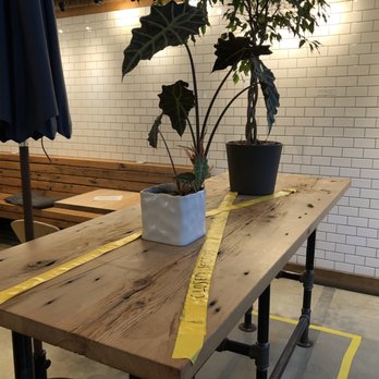 Grounds For Coffee - Closed table with plants~ - Coffee & Tea Near Me - Vancouver, British Columbia Grounds For Coffee - Closed table with plants~ - Coffee & Tea Near Me - Vancouver, British Columbia