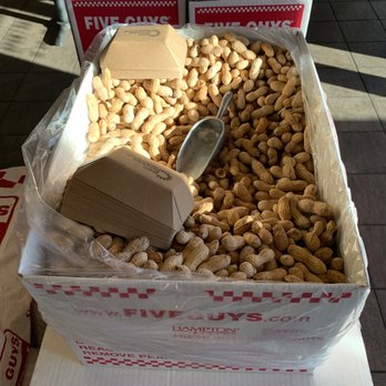 Five Guys - Peanuts are offered when you enter the door at five guys - Burgers Near Me - Valencia, California Five Guys - Peanuts are offered when you enter the door at five guys - Burgers Near Me - Valencia, California