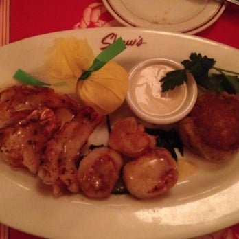 Shaw's Crab House - Shaws signature seafood platter. Butterfly shrimp, scallops, and a crab cake. - Seafood Near Me - Chicago, Illinois Shaw's Crab House - Shaws signature seafood platter. Butterfly shrimp, scallops, and a crab cake. - Seafood Near Me - Chicago, Illinois