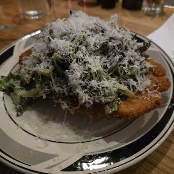 OK Donna - Caesar salad on chicken cutlet - Italian Near Me - Charleston, South Carolina OK Donna - Caesar salad on chicken cutlet - Italian Near Me - Charleston, South Carolina