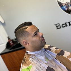 Dustin’s Barbershop - Bald fade with a hard part