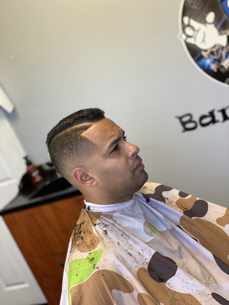 Dustin’s Barbershop Logo