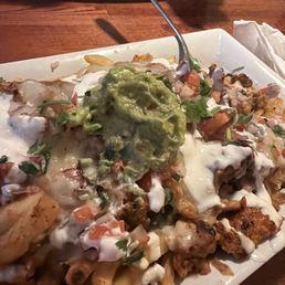 Del Mar loaded fries! Al pastor and chicken, must add beans Del Mar loaded fries! Al pastor and chicken, must add beans