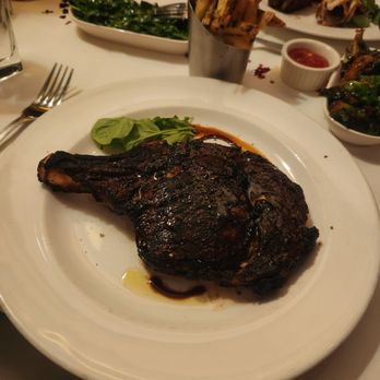 The Capital Grille - Porcini-rubbed Bone-in Ribeye - Steakhouses Near Me - Minneapolis, Minnesota The Capital Grille - Porcini-rubbed Bone-in Ribeye - Steakhouses Near Me - Minneapolis, Minnesota
