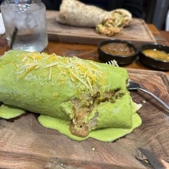 Amelias Mexican Kitchen - Burro with green sauce. Naked burrito in back - Mexican Near Me - Tucson, Arizona