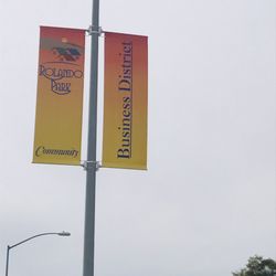 Sam's Beauty Outlet - Signs near the store. Why to represent.