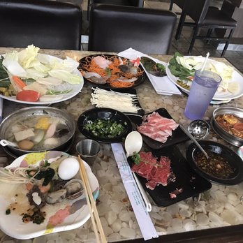 J's Mini Hot Pot - beef bone broth with seafood combination entree. spicy beef bone broth, ramen, and meat combo. - Chinese Near Me - Duluth, Georgia