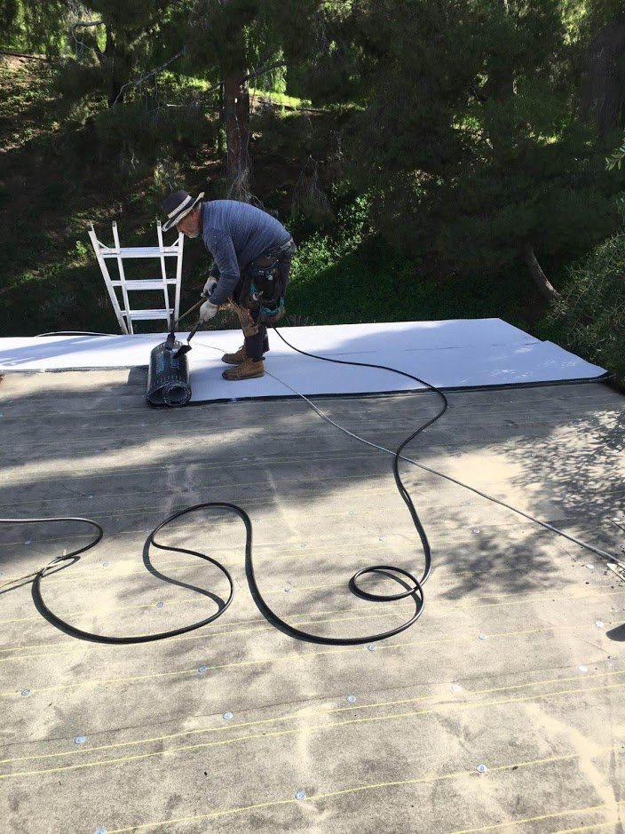 Slide of Rex Roofing