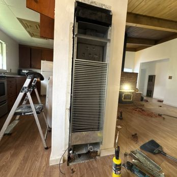 Mendoza Remodeling - the heater was changed for a new one - Flooring Near Me