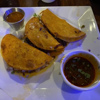 El Patron Grill and Cantina - Birria tacos with extra birria sauce and hot sauce - Mexican Near Me - Methuen, Massachusetts El Patron Grill and Cantina - Birria tacos with extra birria sauce and hot sauce - Mexican Near Me - Methuen, Massachusetts