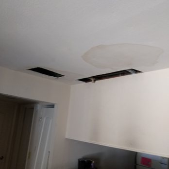 Foxrun Apartments - Living Room Ceiling - cut out sheetrock and water stains - Apartments Near Me - Clifton Park, New York Foxrun Apartments - Living Room Ceiling - cut out sheetrock and water stains - Apartments Near Me - Clifton Park, New York