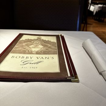 Bobby Van's Grill - Menu and clean table - Steakhouses Near Me - Jamaica, New York Bobby Van's Grill - Menu and clean table - Steakhouses Near Me - Jamaica, New York