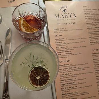 Marta Fine Food and Spirits - Top drink is the crimson & clover Negroni while the bottom cocktail is the last herb - Italian Near Me - Baltimore, Maryland