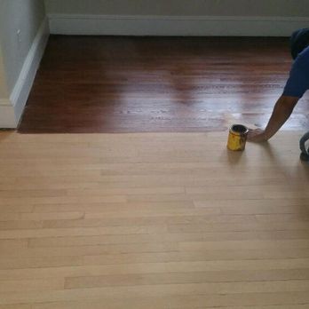 HYM Construction - Sand and stained hardwood floors. - General Contractors Near Me