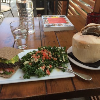 SunCafe - Fiesta burger with raw bun and kale salad on the side. Fresh-from-the-coconut water. :) - Vegan Near Me - Studio City, California SunCafe - Fiesta burger with raw bun and kale salad on the side. Fresh-from-the-coconut water. :) - Vegan Near Me - Studio City, California