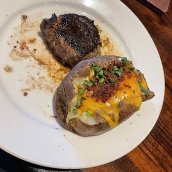 Zack Garvin's Original Steak House - 8 oz. Ribeye and loaded baked potato - Steakhouses Near Me - Newton, Mississippi Zack Garvin's Original Steak House - 8 oz. Ribeye and loaded baked potato - Steakhouses Near Me - Newton, Mississippi