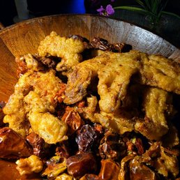 RED LANTERN  65  Red Lantern Hutong's signature crispy spiced soft-shell crab on a bed of dried whole chilies