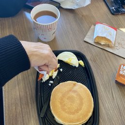 a pancake and a cup of coffee a pancake and a cup of coffee