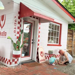 Cakette Bakeshop - Playing with chalk outside