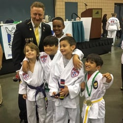 Inspiration Martial Arts Kennesaw - Master Arcemont and students at an area tournament