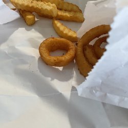 Nearly Famous Burgers & Hot Dogs - Onion rings and fries ,,, plenty of fries in the order!!