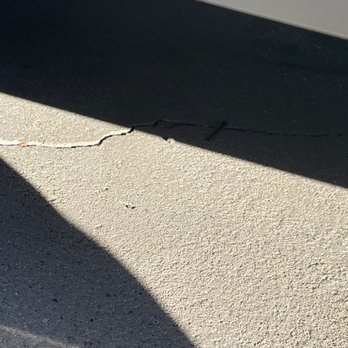 HUS Roofing - nail next to my car - Roofing Near Me - Los Angeles, California