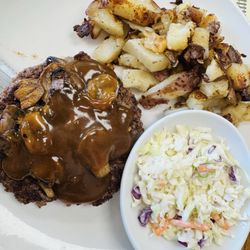 Breakfast Station - Hamburger steak w/gravy & onions. Slaw & home fries.