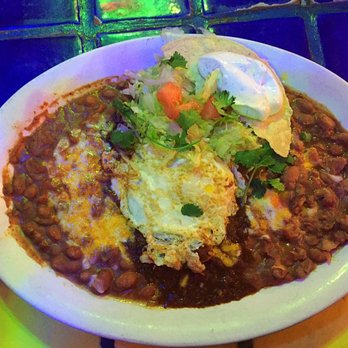 Los Dos Molinos - The Enchilada Plate .. Blue Corn with Green Chile topped with a over easy fried egg.Mexican food is never photogenic! - New Mexican Cuisine Near Me - Phoenix, Arizona Los Dos Molinos - The Enchilada Plate .. Blue Corn with Green Chile topped with a over easy fried egg.Mexican food is never photogenic! - New Mexican Cuisine Near Me - Phoenix, Arizona