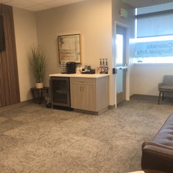 Colorado Surgical Arts - Waiting area with waters and coffee available.