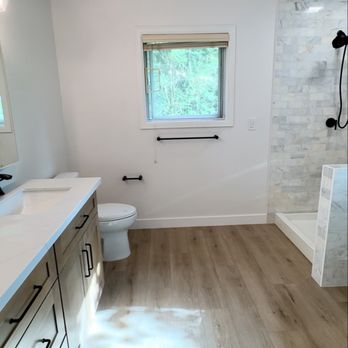 Skyline Builders - After: Gorgeous custom vanity & LVP flooring. - General Contractors Near Me - Bellevue, Washington Skyline Builders - After: Gorgeous custom vanity & LVP flooring. - General Contractors Near Me - Bellevue, Washington